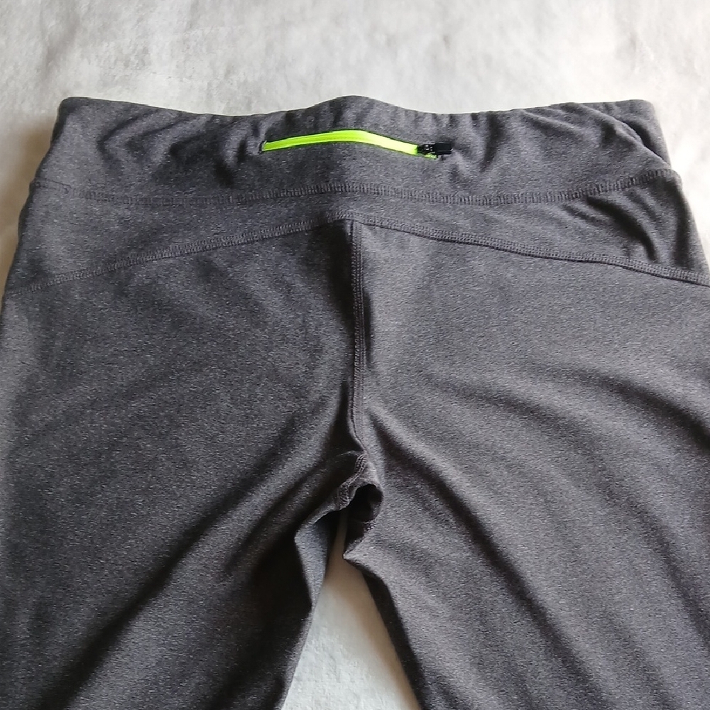 Xersion Charcoal Capri Leggings with Neon Yellow Accents - Picture 5 of 10